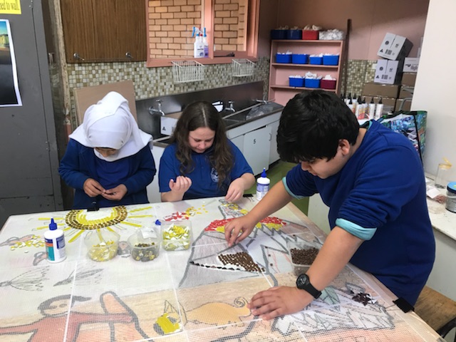  St Georges Primary School students working on Dunggula mural
